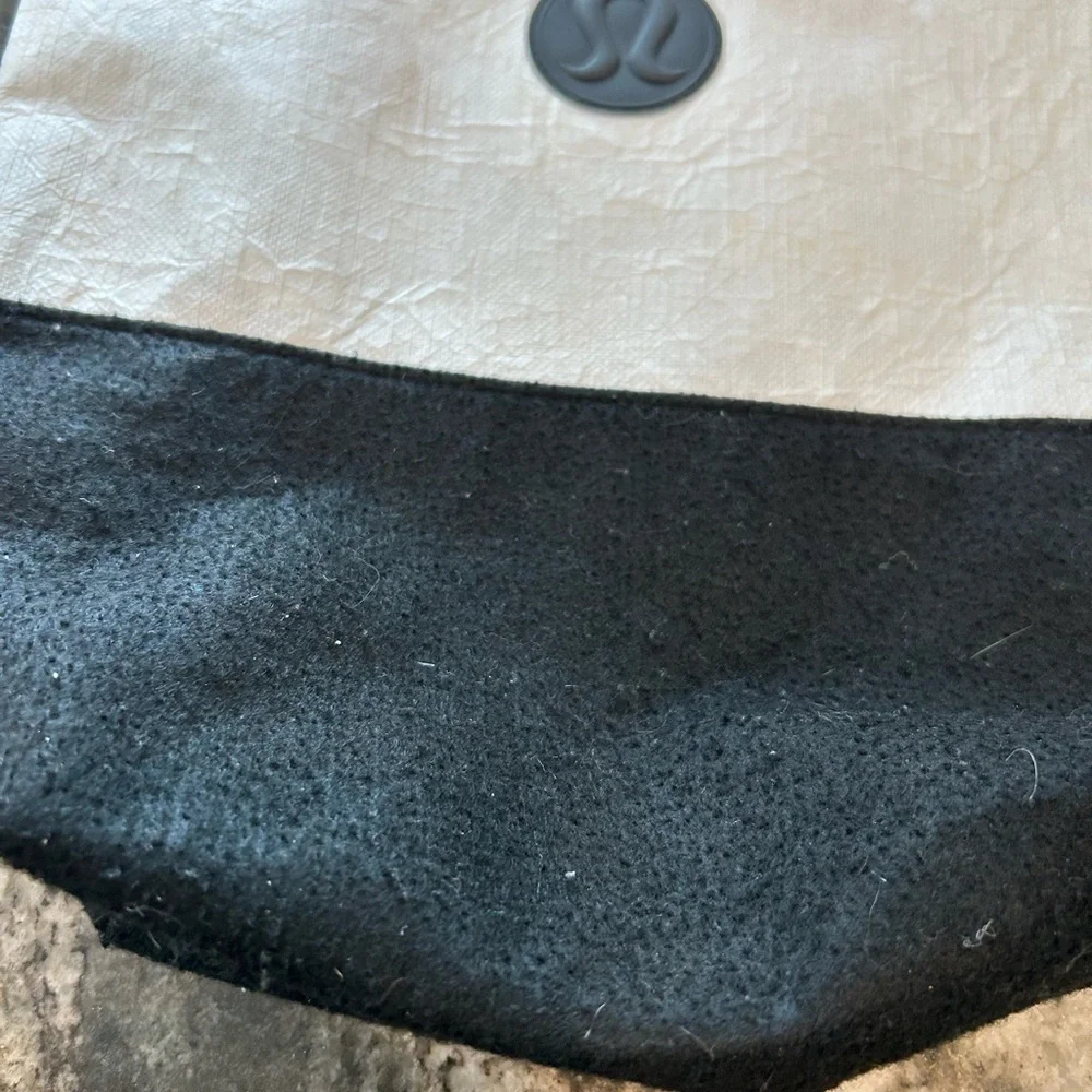 lululemon athletica Black and Cream Tote has wear stains piling